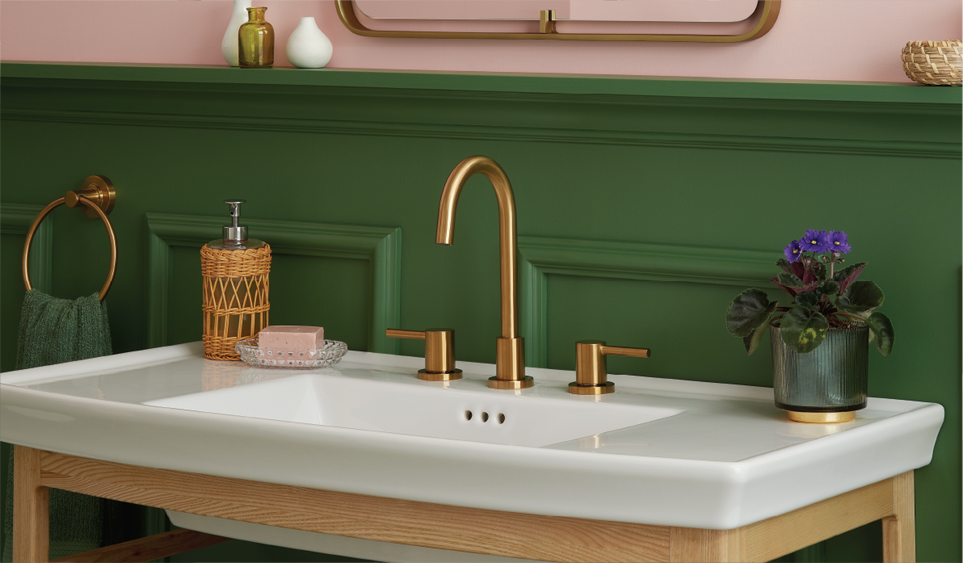 console sink with brass widespread faucet