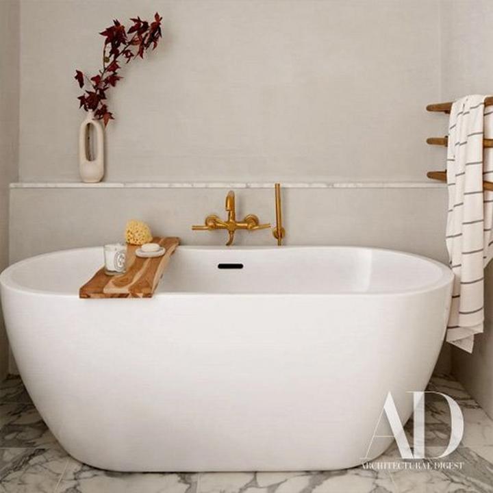 freestanding bathtub with brass tub faucet