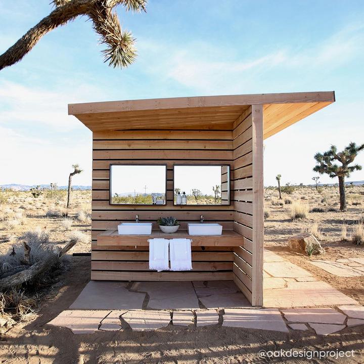 Yurt and outdoor bathroom designed by Rachelle Lazzaro and Kevin Bennert of Oak Design Project