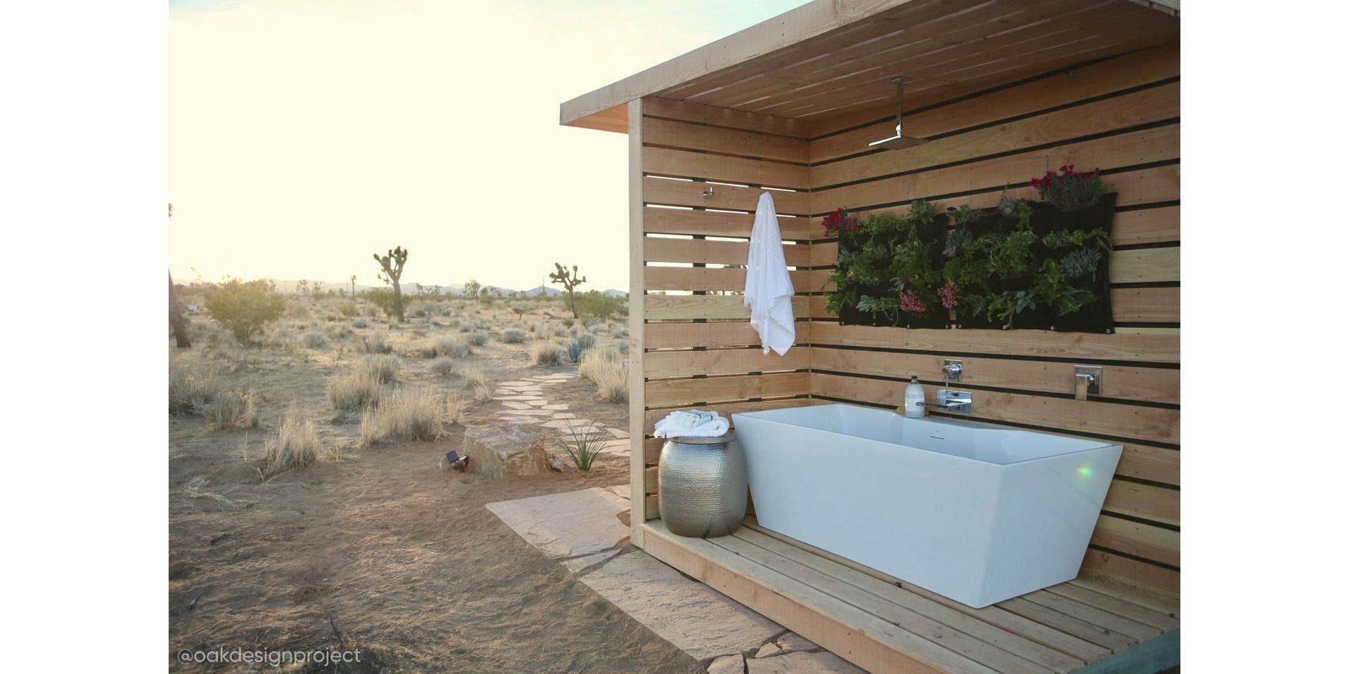 Outdoor bathroom by Oak Design Project with 67" Hibiscus Rectangular Freestanding Tub, Lavelle Wall-Mount Waterfall Tub Faucet