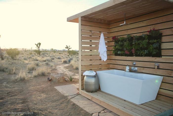 Outdoor bathroom by Oak Design Project with 67" Hibiscus Rectangular Freestanding Tub, Lavelle Wall-Mount Waterfall Tub Faucet