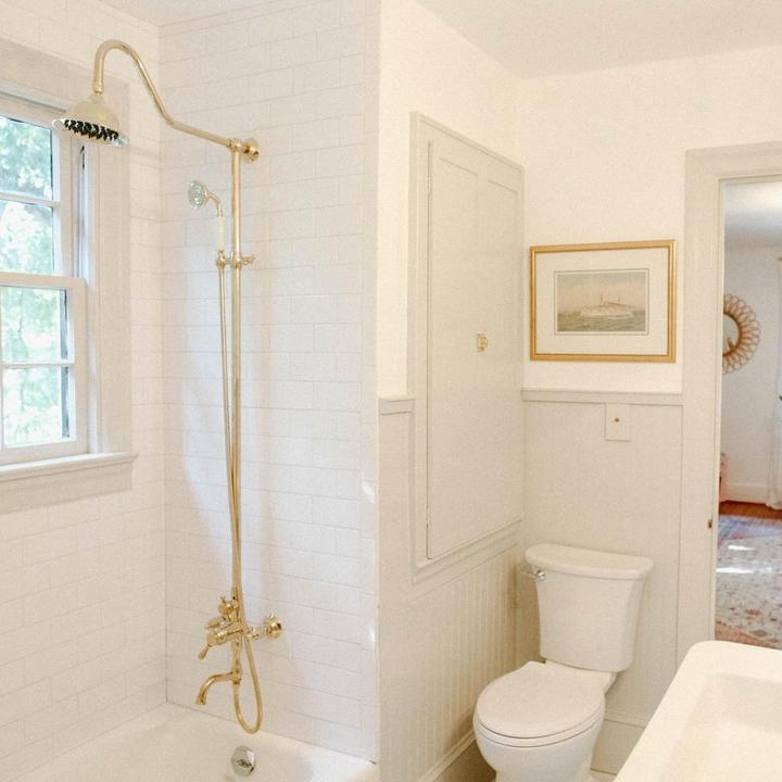 bathroom with exposed pipe shower