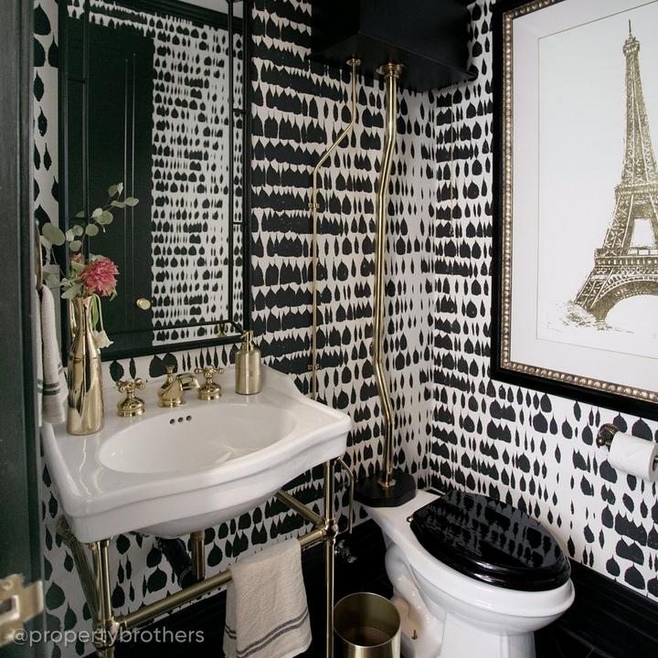 Small bathroom designed by the Scott Brothers with the 30" Cierra Console Sink with Brass Stand