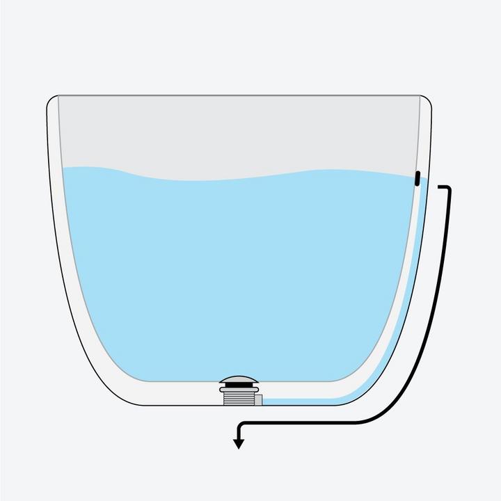 Water draining a tub through the integral overflow