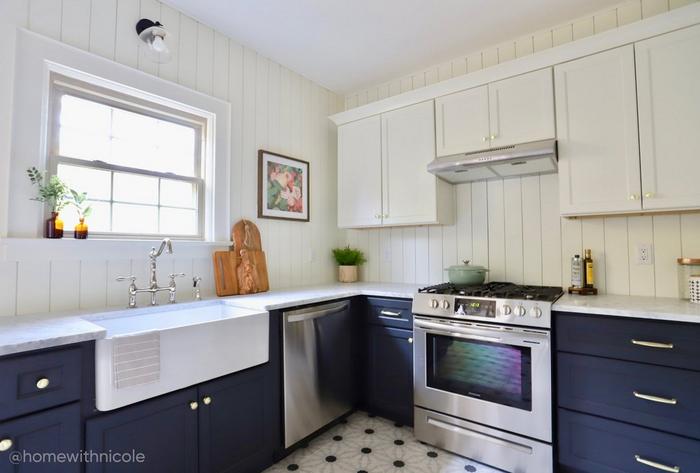 Kitchen by Revival Designs' Nicole Nichols with the Bellevue Bridge Faucet in Chrome, 30" Reinhard Fireclay Farmhouse Sink