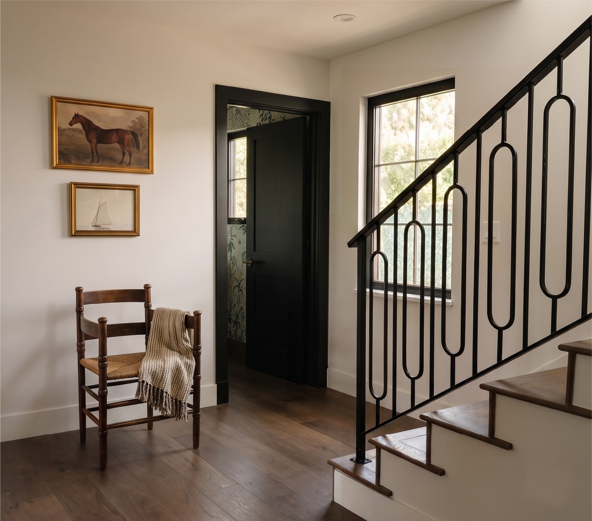 Ryan Saghian Clifton House doorway with the Satcher Brass Privacy Interior Door Set - Antique Brass