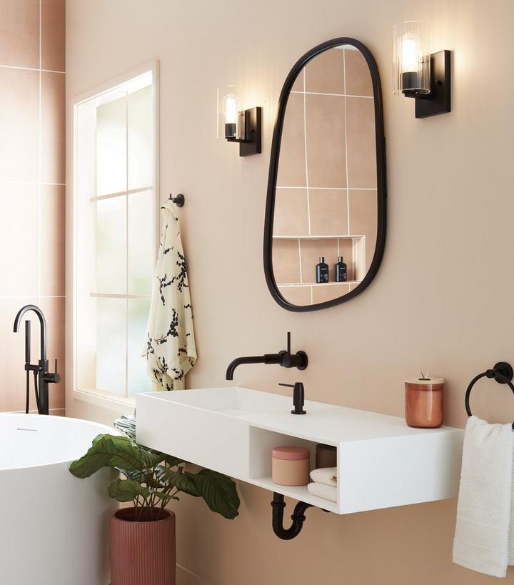 modern bathroom with wall mount vanity and black bathroom hardware