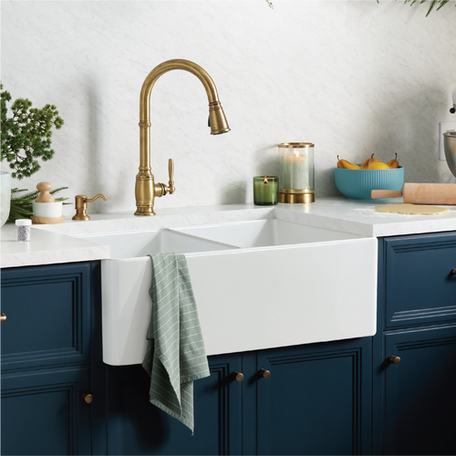 farmhouse sink with gold kitchen faucet