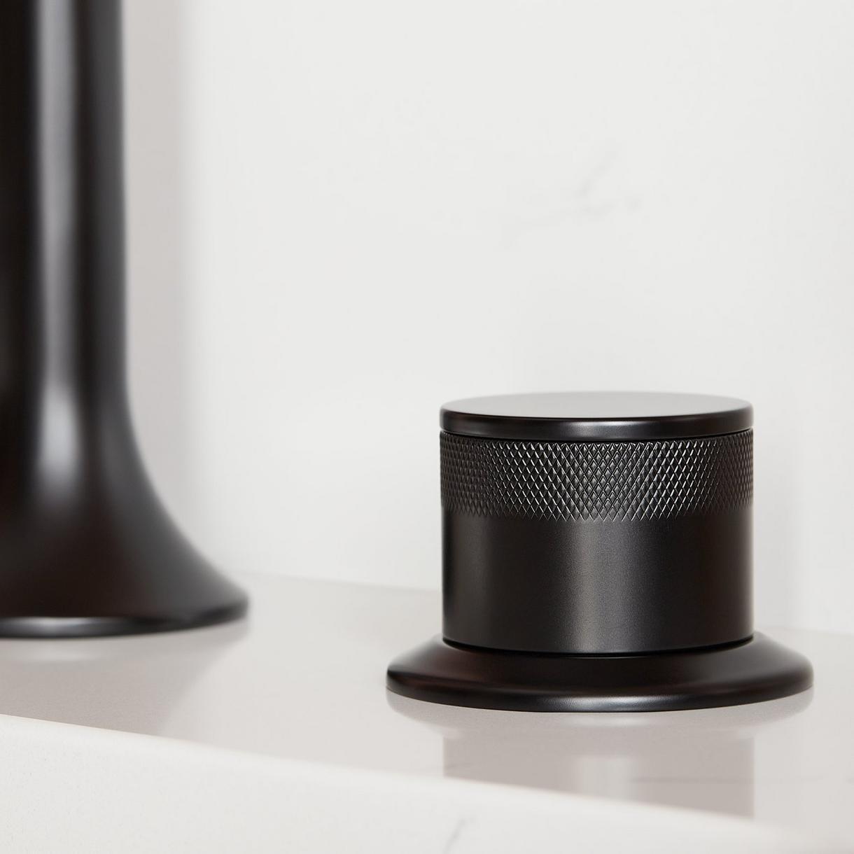 Closeup of Lentz Widespread Bathroom Faucet - Knob Handles - Matte Black