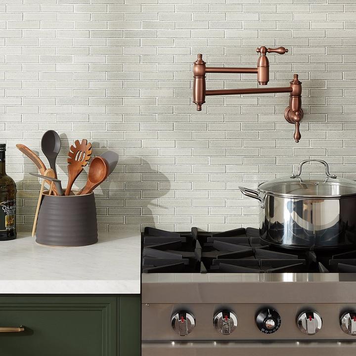 Augusta Retractable Wall-Mount Pot Filler in Antique Copper  for functional kitchen designs