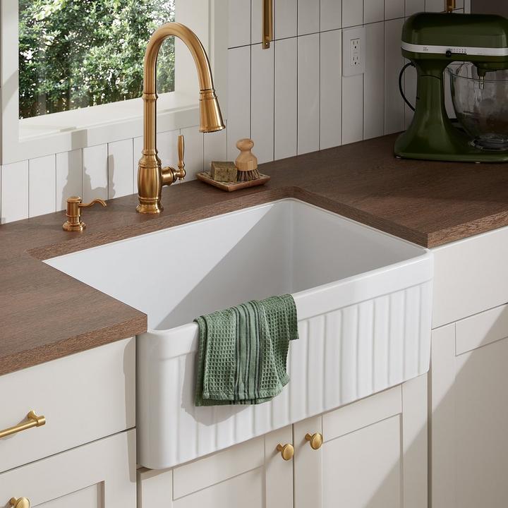30" Curington Fireclay Farmhouse Sink, Finnian Pull-Down Kitchen Faucet in Brushed Gold and other finishing touches