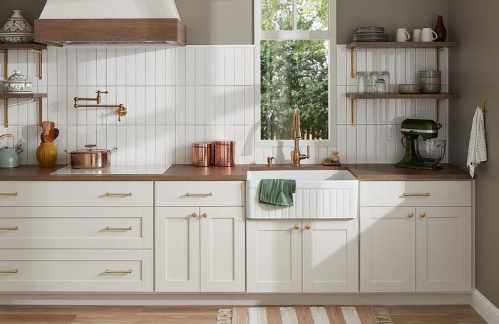 White kitchen with the Finnian Kitchen Faucet, Traditional Wall-Mount Pot Filler in Brushed Gold, Curington Farmhouse Sink