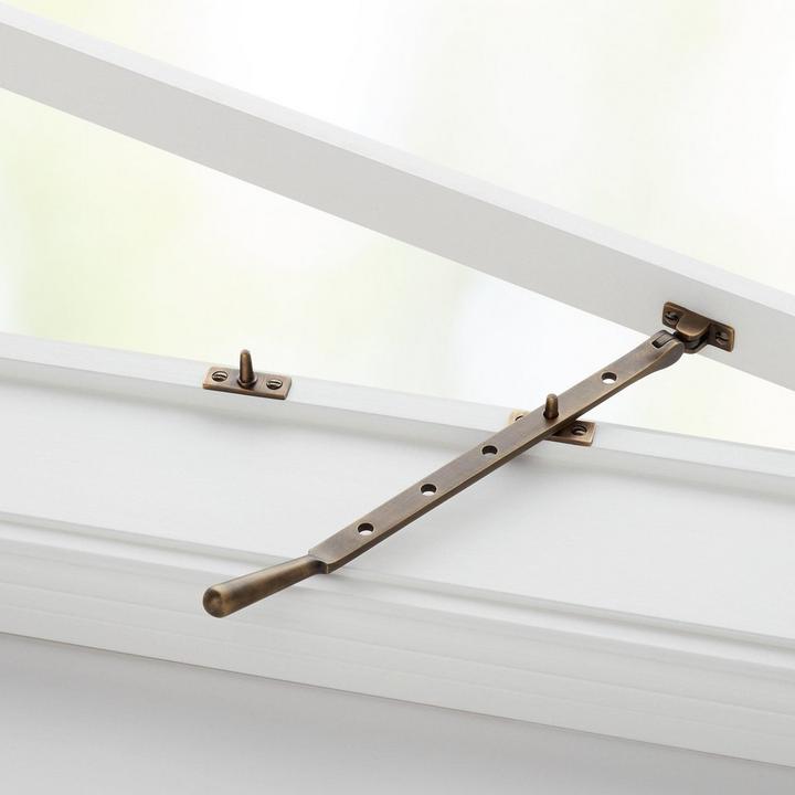 Solid Brass Casement Window Stay in Antique Brass for window hardware