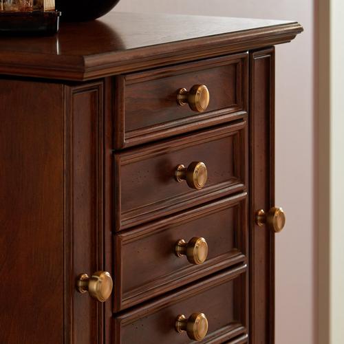 Wood cabinet with the Spurlock Cabinet Knob in Champagne Bronze