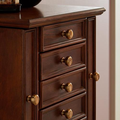 Wood cabinet with the Spurlock Cabinet Knob in Champagne Bronze