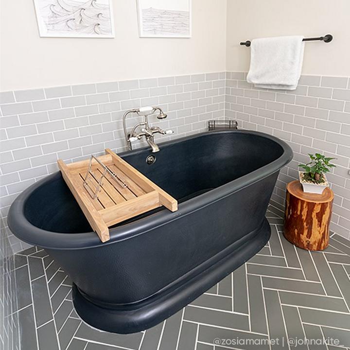 Bathroom of Zosia Mamet & Evan Jonigkeit Rotunda Towel Bar in Matte Black, Freestanding Telephone Tub Faucet in Polished Nickel